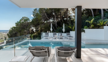 Resa Estates luxury vila Can Furnet modern Villa moderna terrace and day beds.jpg